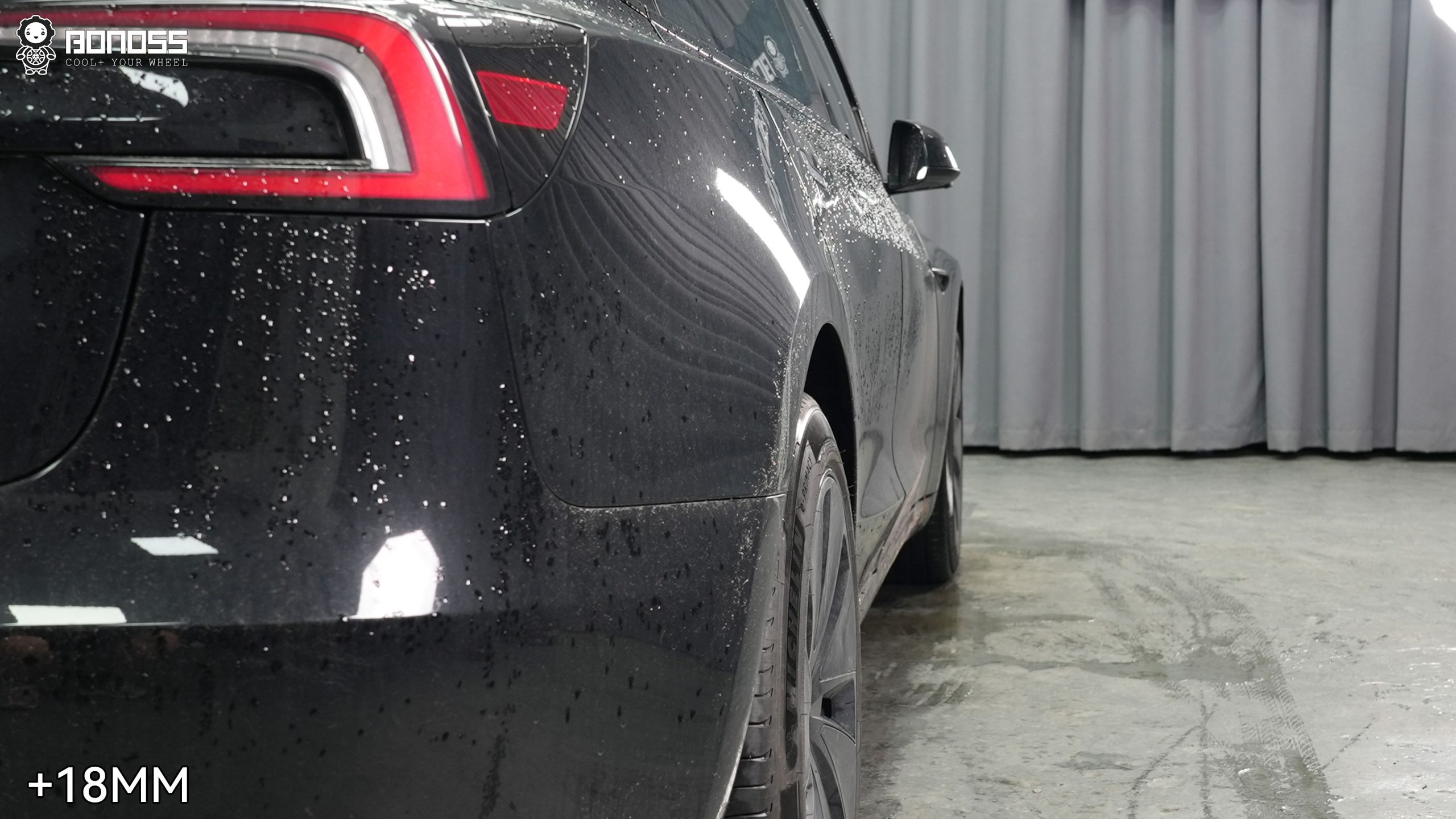 model-3-18mm-wheel-spacers-right-rear-after-fitment Finished right-rear wheel placement following Model 3 18mm wheel spacers fitment.