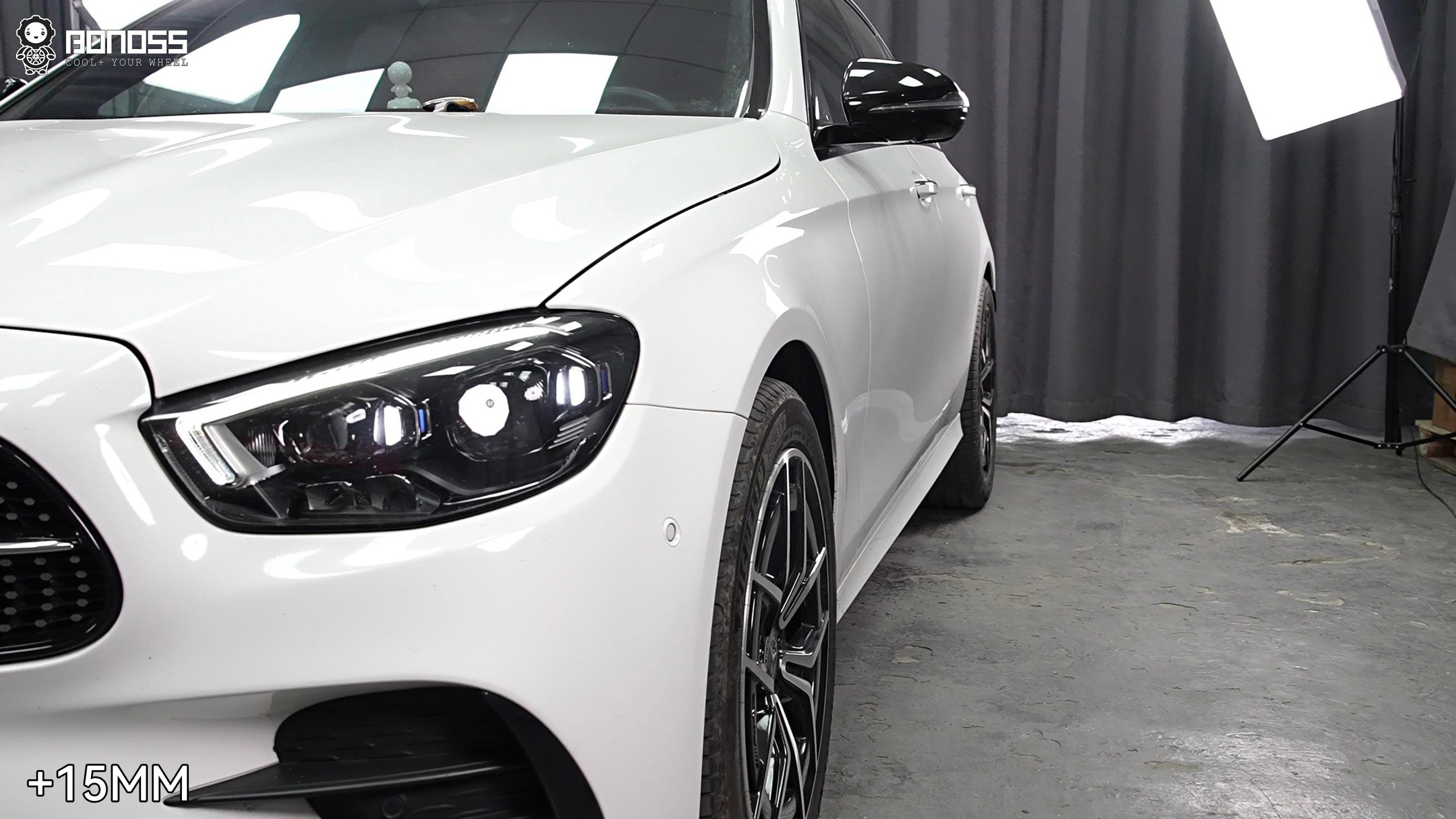 right-front-flush-stance-with-2021-mercedes-benz-e-class-15mm-spacers Right-front wheel sitting flush with the fender on a 2021 Mercedes-Benz E-Class after spacers.