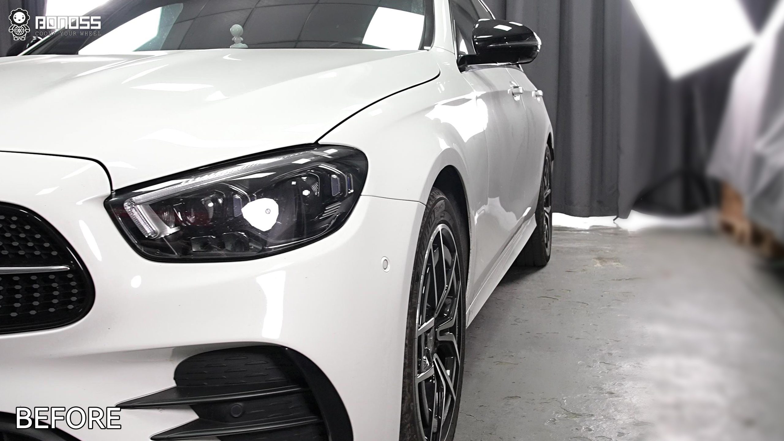 right-front-wheel-before-2021-mercedes-benz-e-class-15mm-spacers Stock right-front wheel position on a 2021 Mercedes-Benz E-Class prior to spacer installation.