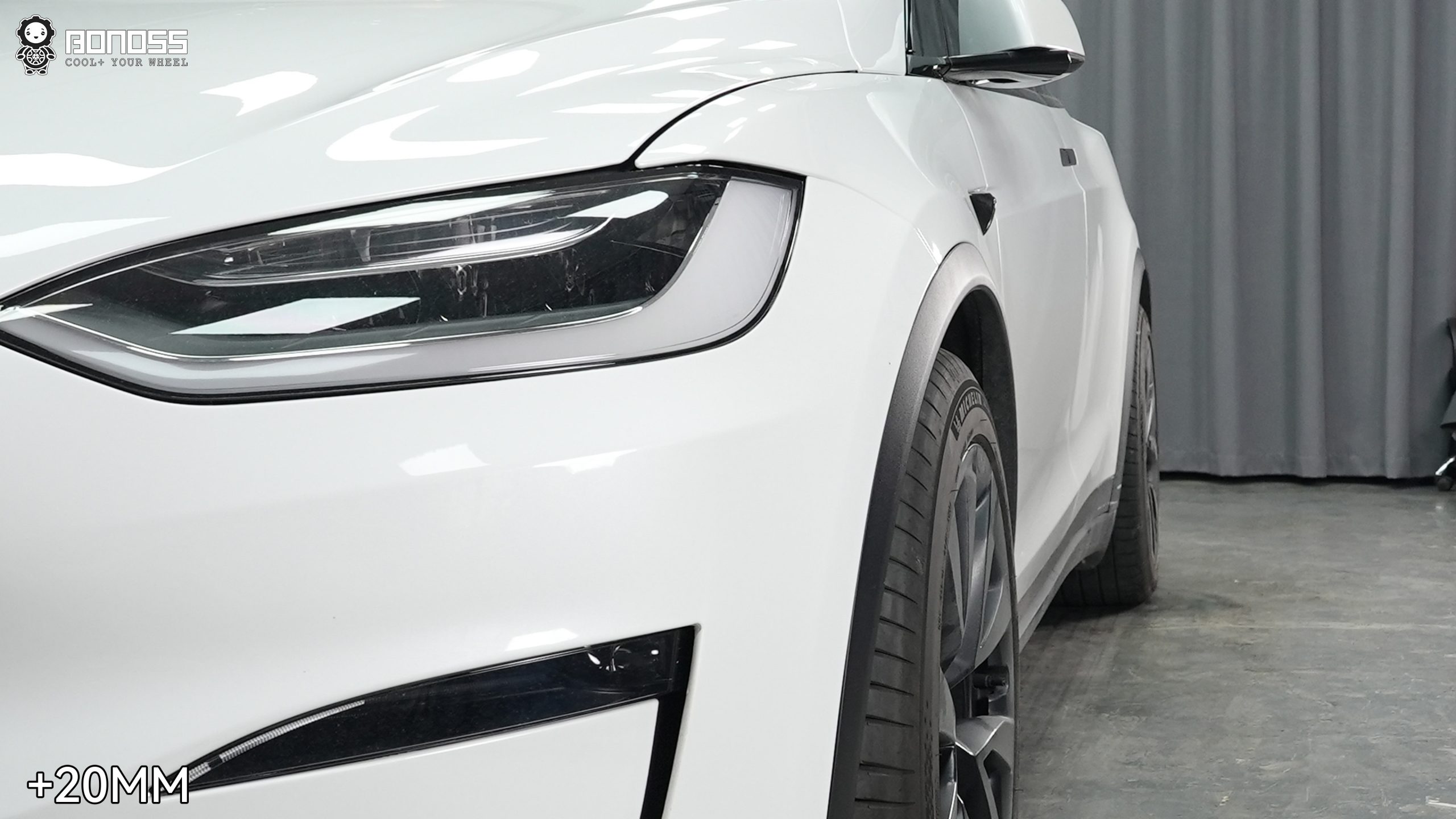 right-front-wheel-of-2023-tesla-model-x-after-spacer-upgrade Right front wheel aligned to the fender on a 2023 Tesla Model X after spacer upgrade.