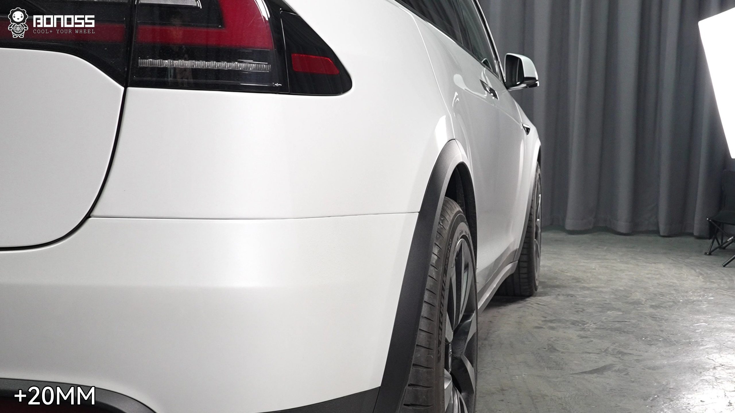 right-rear-wheel-of-2023-tesla-model-x-after-flush-fitment Flush right rear fitment achieved on a 2023 Tesla Model X using a 20mm spacer.