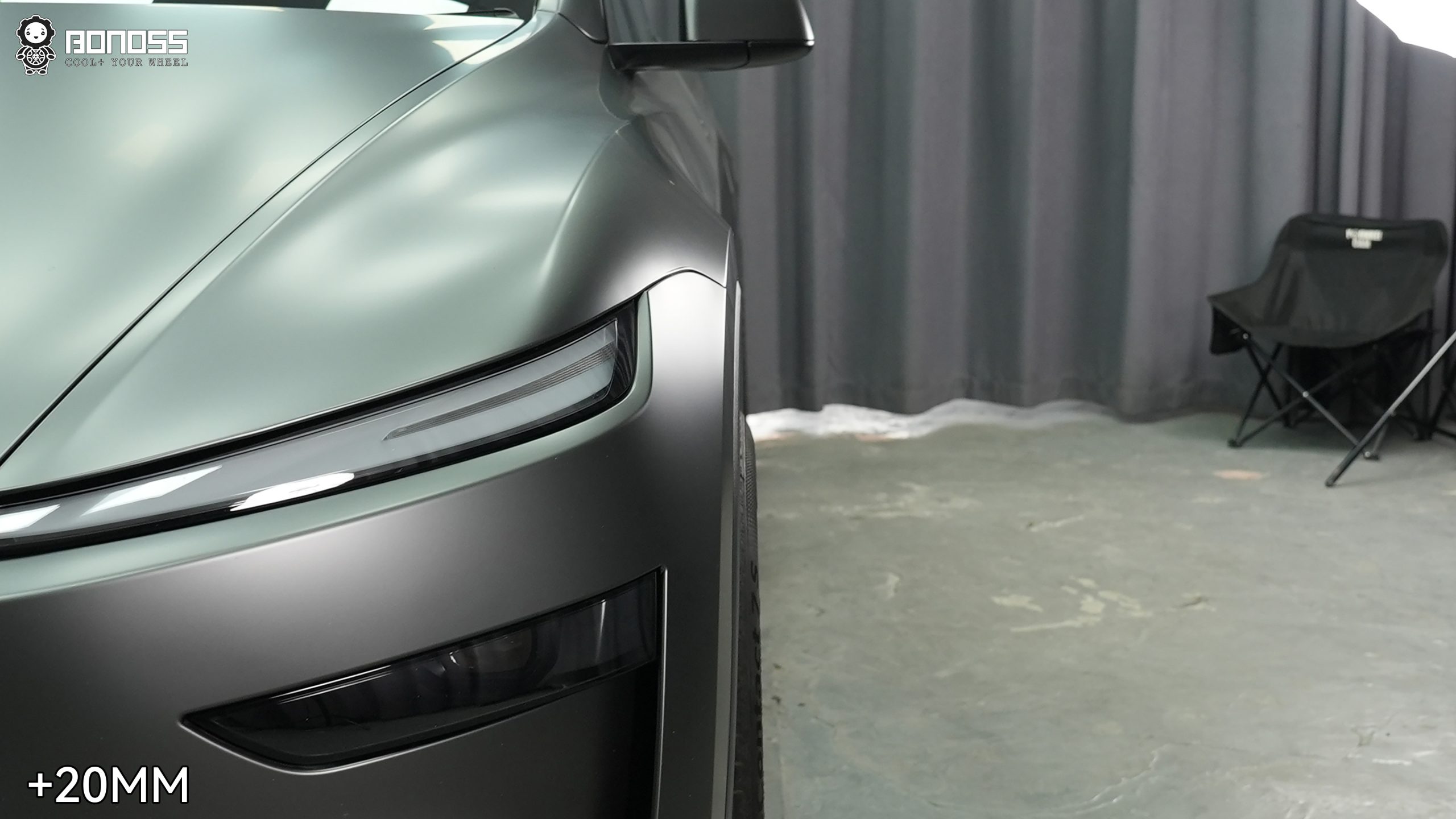 tesla-model-y-front-wheel-after-spacers-flush Tesla Model Y right front wheel after BONOSS wheel spacer installation, showing a flush fitment with the fender