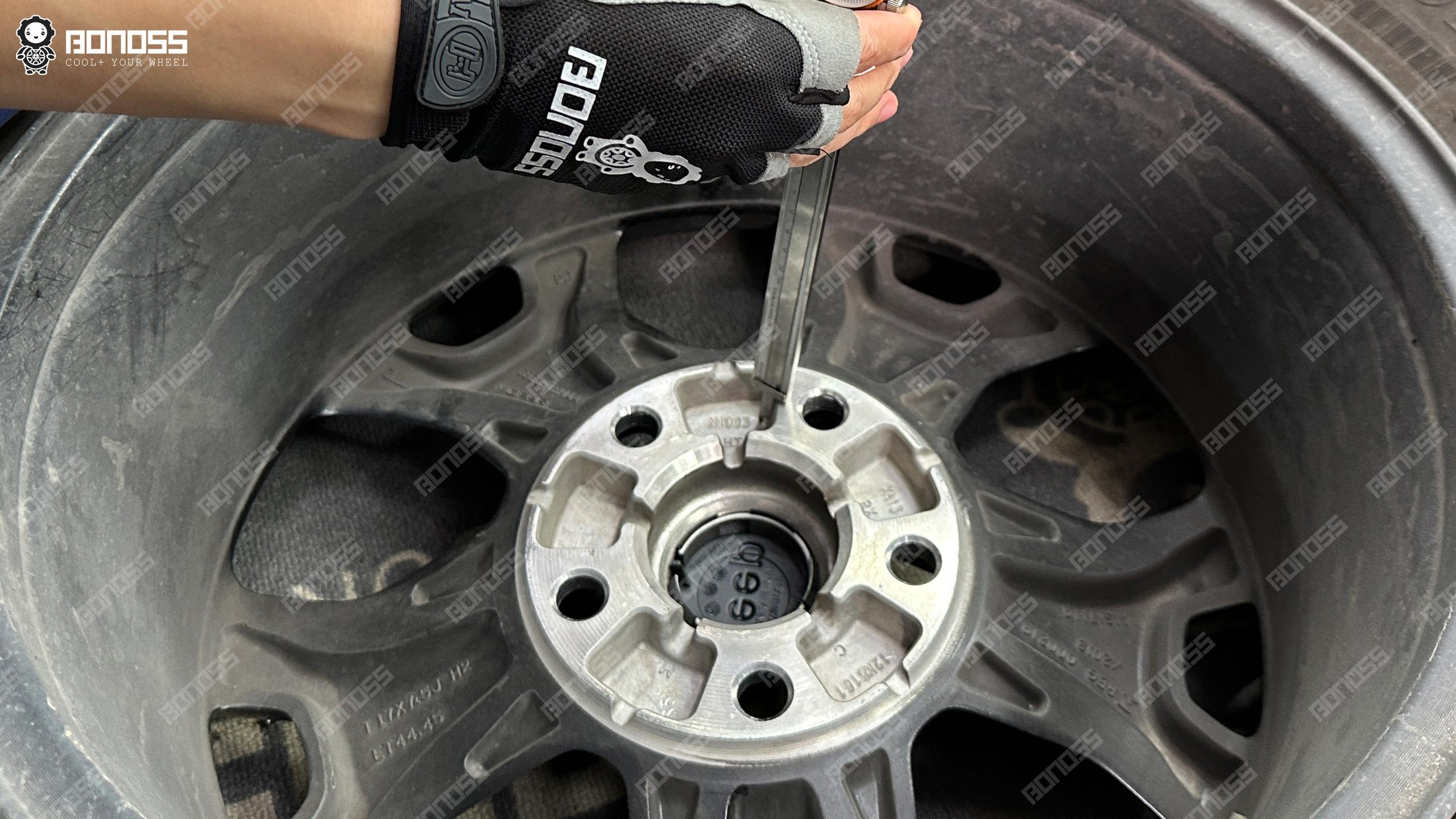 vernier-caliper-gauges-wheel-pocket-depth-jeep-wrangler-jl Caliper depth rod inside a wheel recess of a 2021 Wrangler Rubicon confirming pocket depth before choosing spacers.